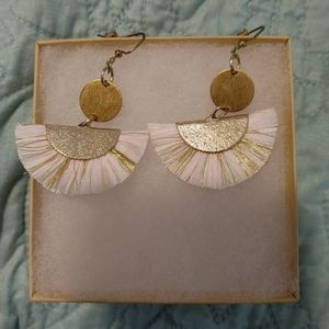 Pink and gold earrings.